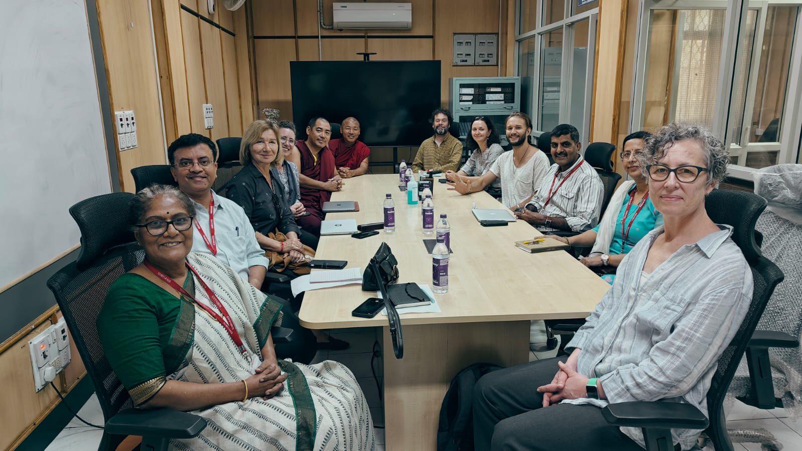 During Goldman and Tidwell's trip, they visited India’s National Institute of Mental Health and Neurosciences. Pictured here is the Tukdam Project team in the Center for Consciousness Studies conference room.