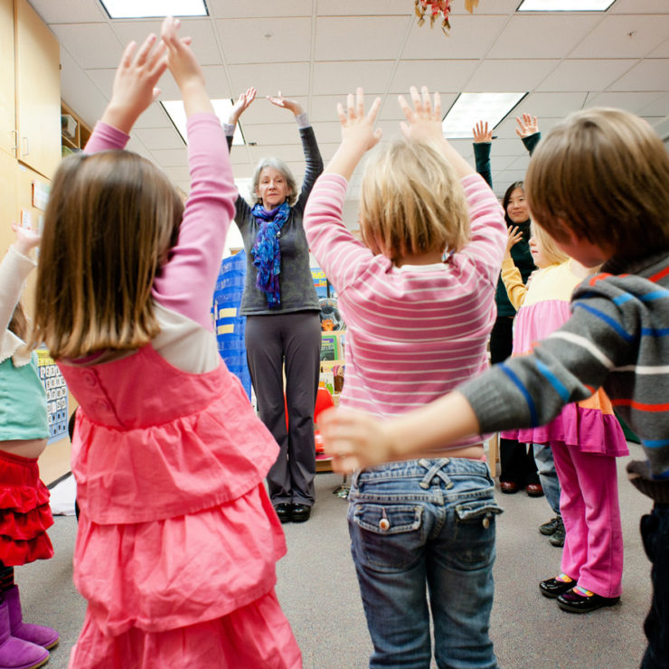 Young kids participate in mindful movement as part of Kindness Curriculum