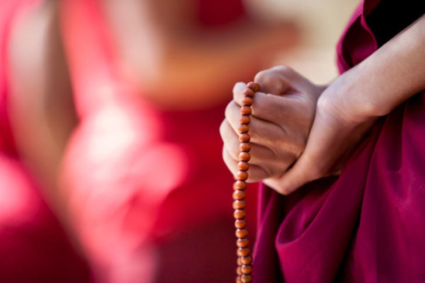 Monk With Prayer Beads