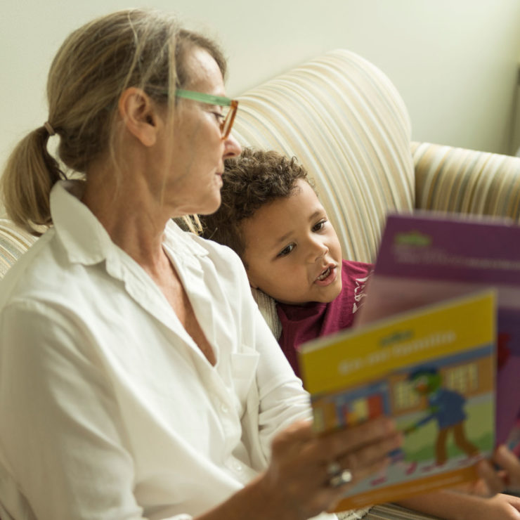Woman Reading To A Child