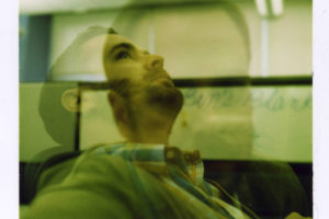 Photo of a man looking up and daydreaming by benprks via Flickr